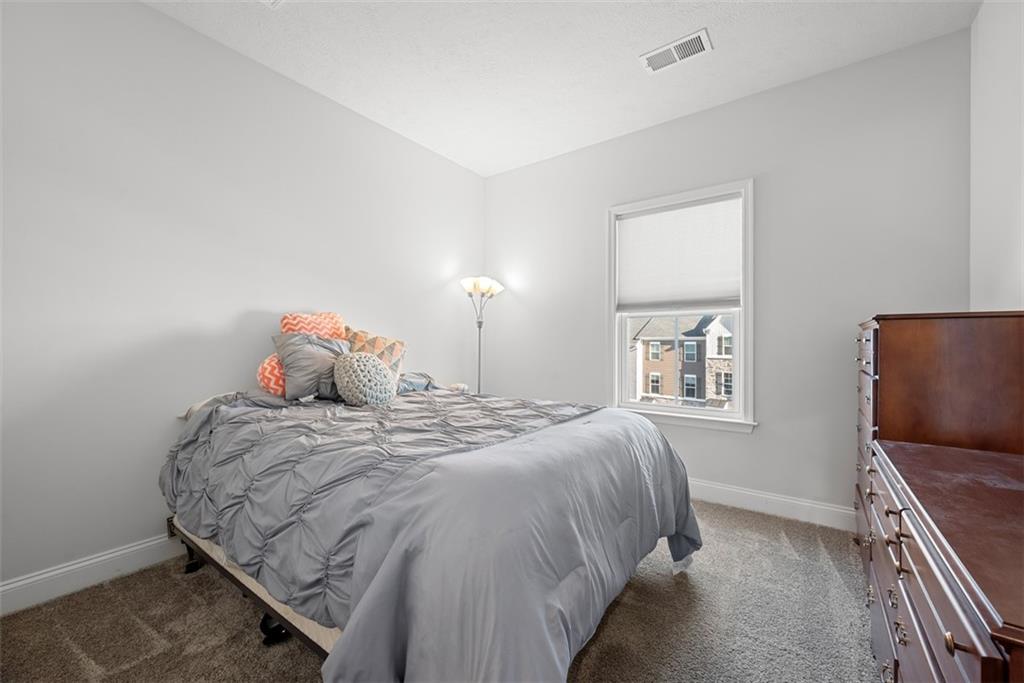 131 Cole Drive McKees Rocks, PA 15136 - Photo 25 of 42 a bedroom with a bed and a window