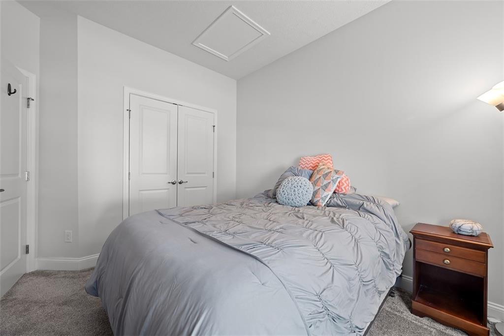 131 Cole Drive McKees Rocks, PA 15136 - Photo 26 of 42 a bedroom with a bed and a television
