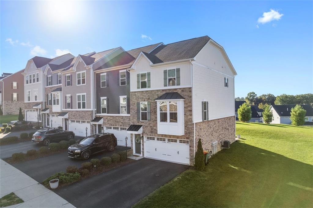 131 Cole Drive McKees Rocks, PA 15136 - Photo 3 of 42 a view of a house with a yard