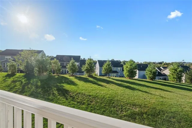a view of a golf course with a lake