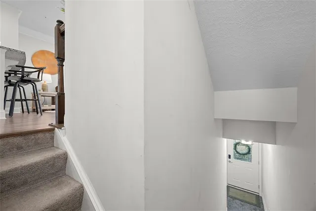 a bathroom with a light fixture and a sink