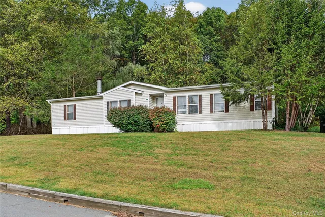 a house with trees in front of it