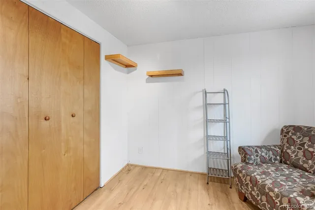 a view of livingroom with furniture and wooden floor