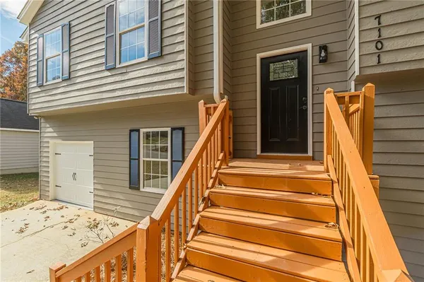 a view of a house with a large window