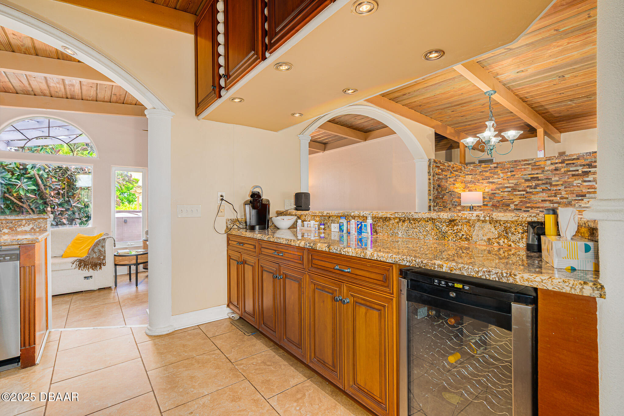 46 Oceanview Avenue Ponce Inlet, FL 32127 - Photo 18 of 79 a kitchen with stainless steel appliances granite countertop a sink and a counter