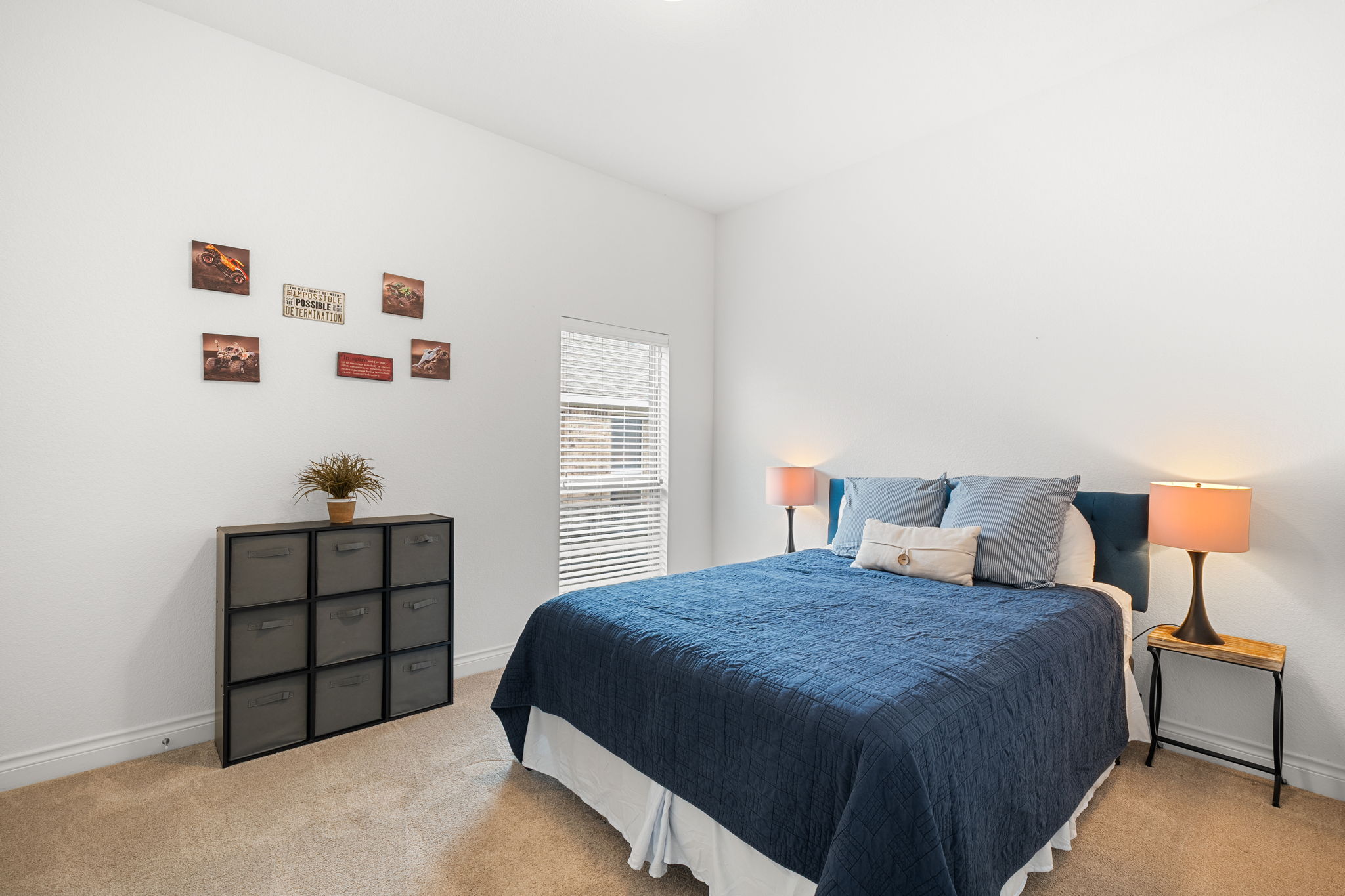 1908 Woolsey Way Leander, TX 78641 - Photo 18 of 36 Bedroom #3 features neutral walls, brand-new carpeted flooring, and a large window providing ample natural light.