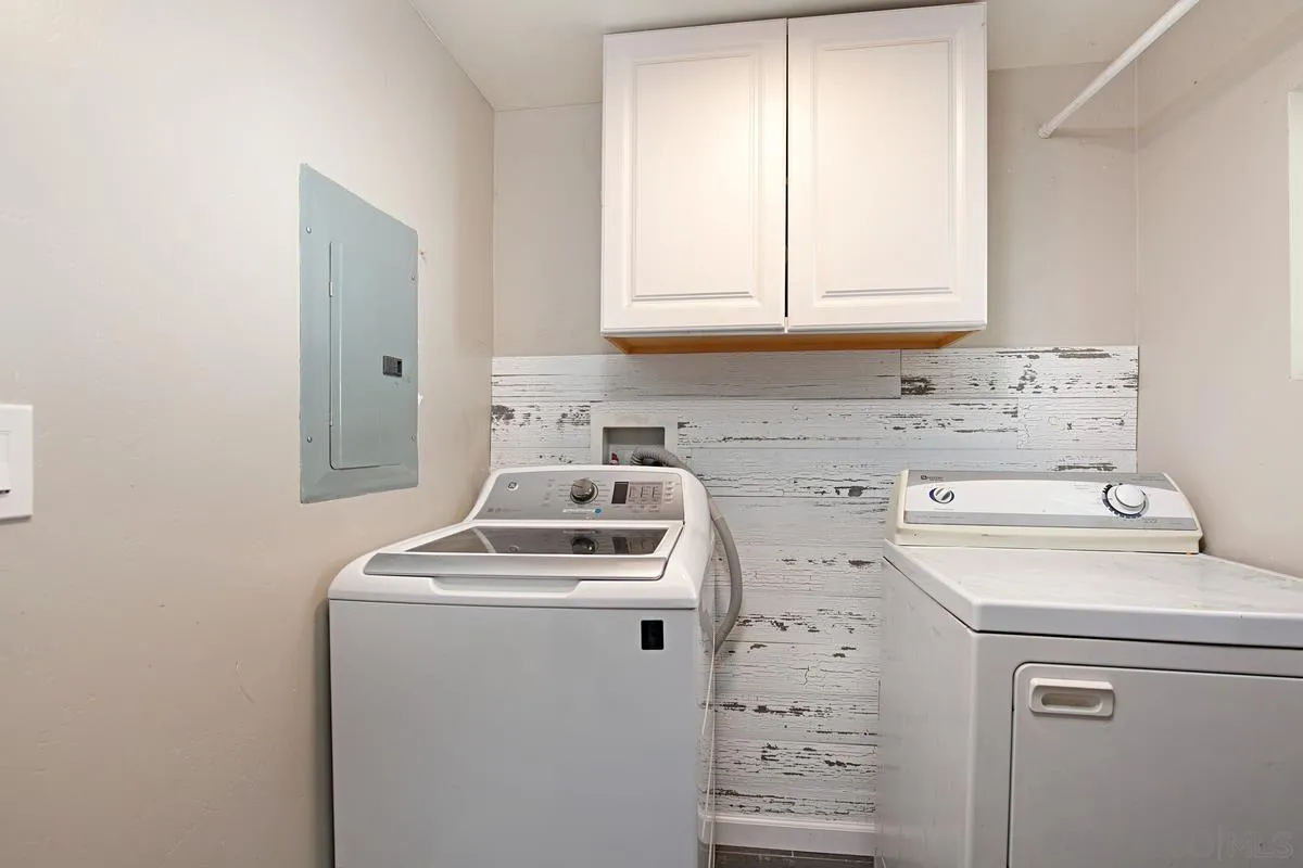 10390 Del Rio Road Spring Valley, CA 91978 - Photo 21 of 38 a utility room with dryer and washer