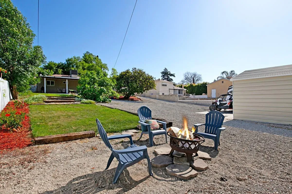 10390 Del Rio Road Spring Valley, CA 91978 - Photo 32 of 38 a view of a backyard with furniture and garden