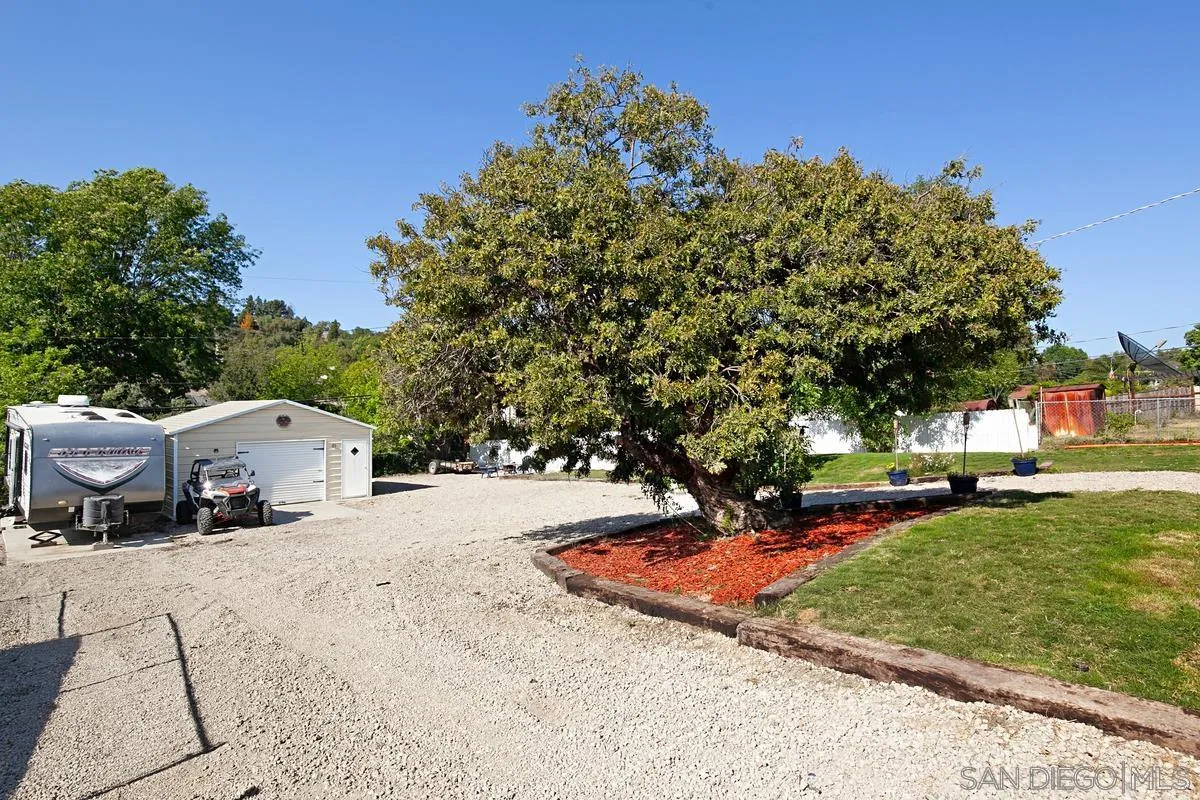 10390 Del Rio Road Spring Valley, CA 91978 - Photo 35 of 38 a view of a yard with cars