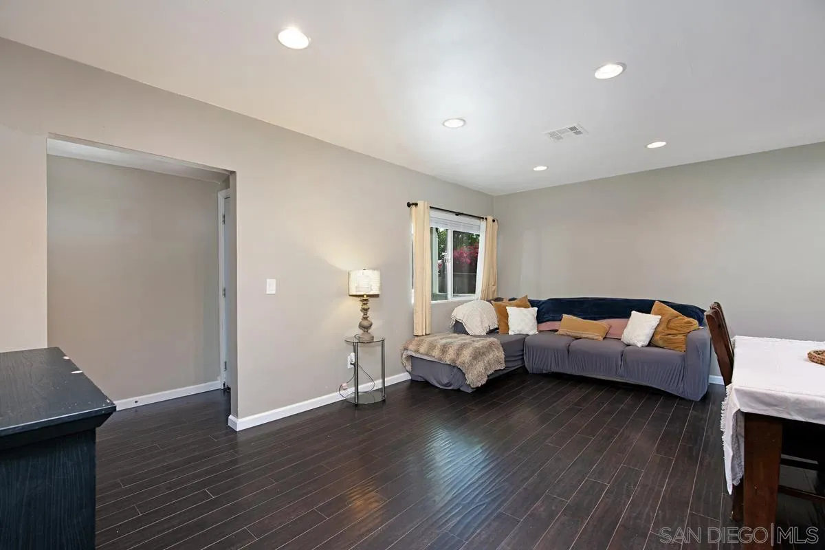10390 Del Rio Road Spring Valley, CA 91978 - Photo 5 of 38 a living room with furniture and wooden floor