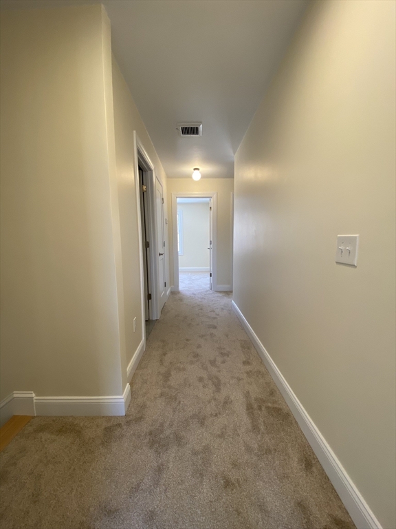 855 County Street, Unit 2 Attleboro, MA 02703 - Photo 14 of 27 a view of hallway with livingroom