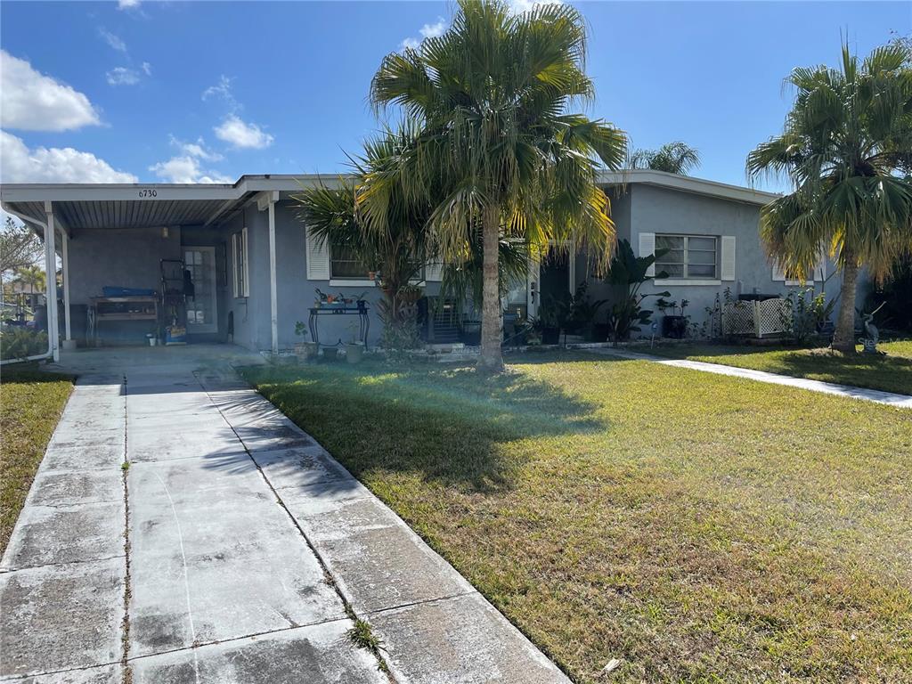 6730 Marius Road North Port, FL 34287 - Photo 1 of 1 covered carport door leads to master bedroom.