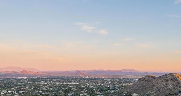 a view of city and mountain