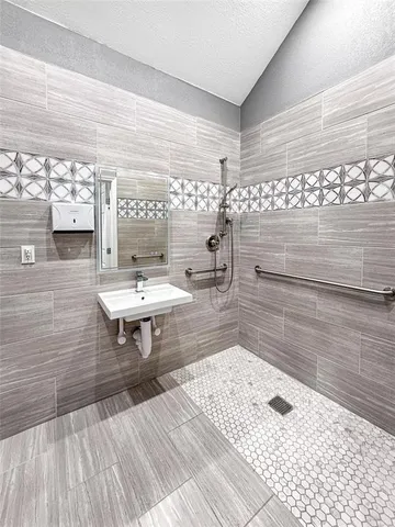 a living room with couch and a table