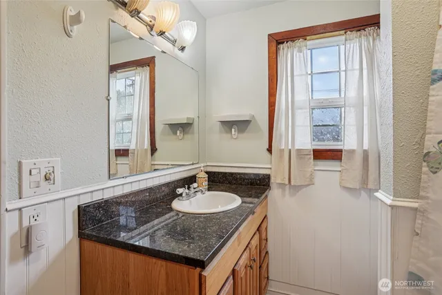 a view of storage and utility room with washer and dryer