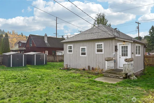 a picture of a bench in front of a wall