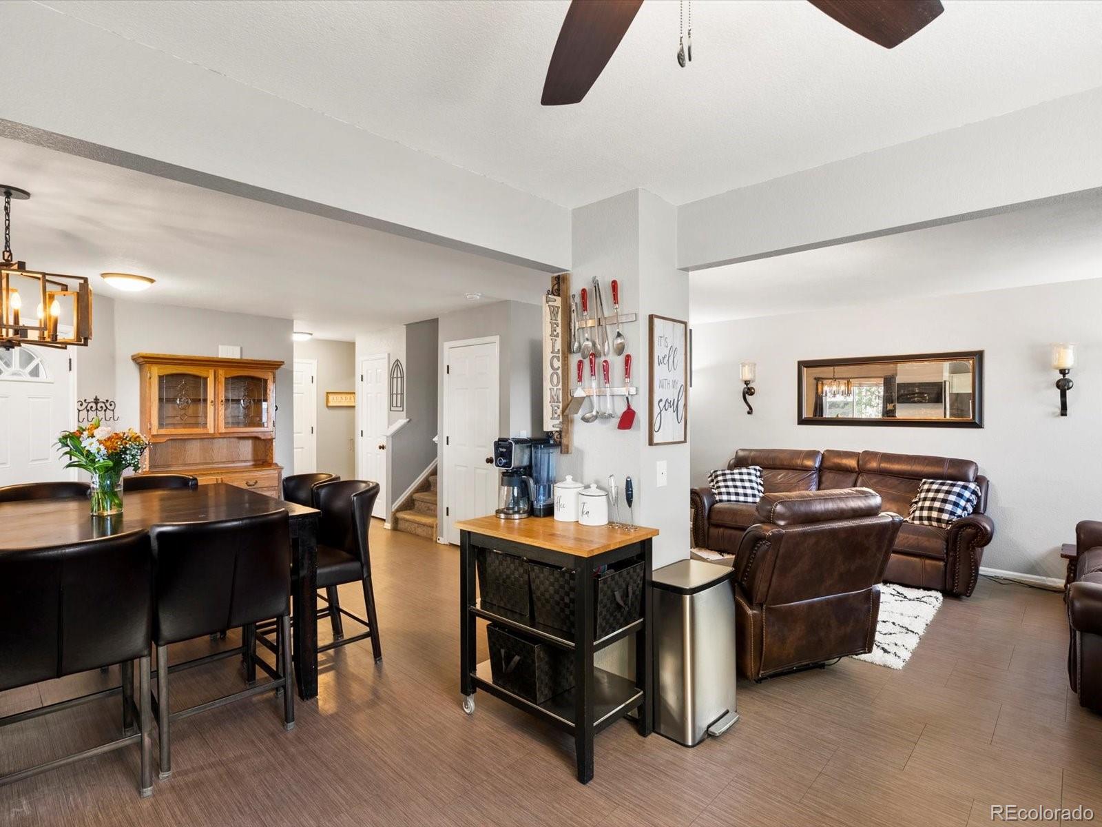 9657 Ironton Street Commerce City, CO 80022 - Photo 16 of 48 a view of a workspace with furniture and a window