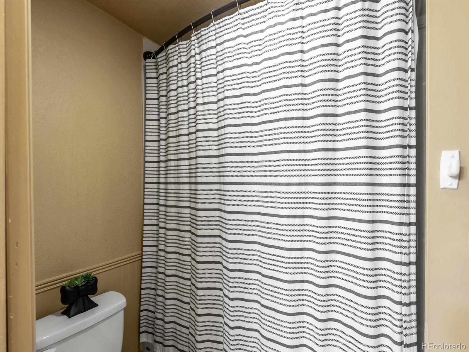 9657 Ironton Street Commerce City, CO 80022 - Photo 37 of 48 a view of a room with a window