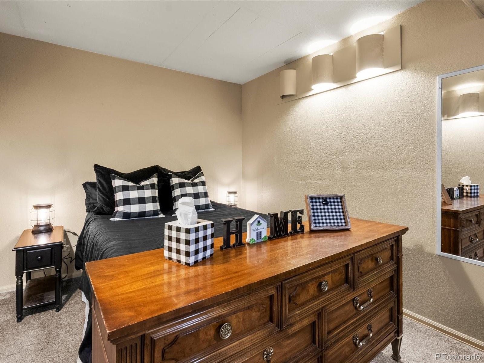 9657 Ironton Street Commerce City, CO 80022 - Photo 39 of 48 a room with furniture and air hockey table