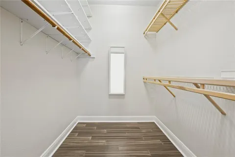 a view of a room with racks on the wall
