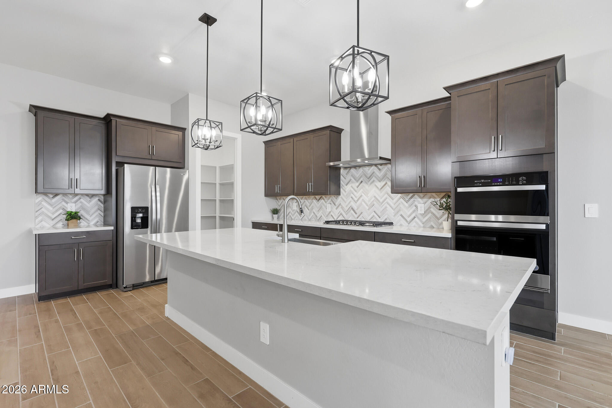 17633 West Pierson Street Goodyear, AZ 85395 - Photo 9 of 53 Kitchen with huge island