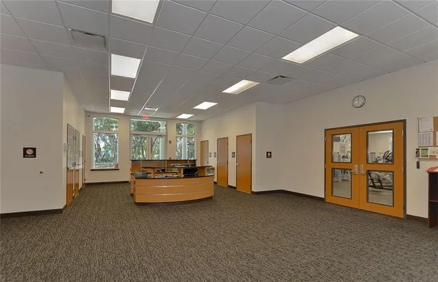 a view of empty room with windows