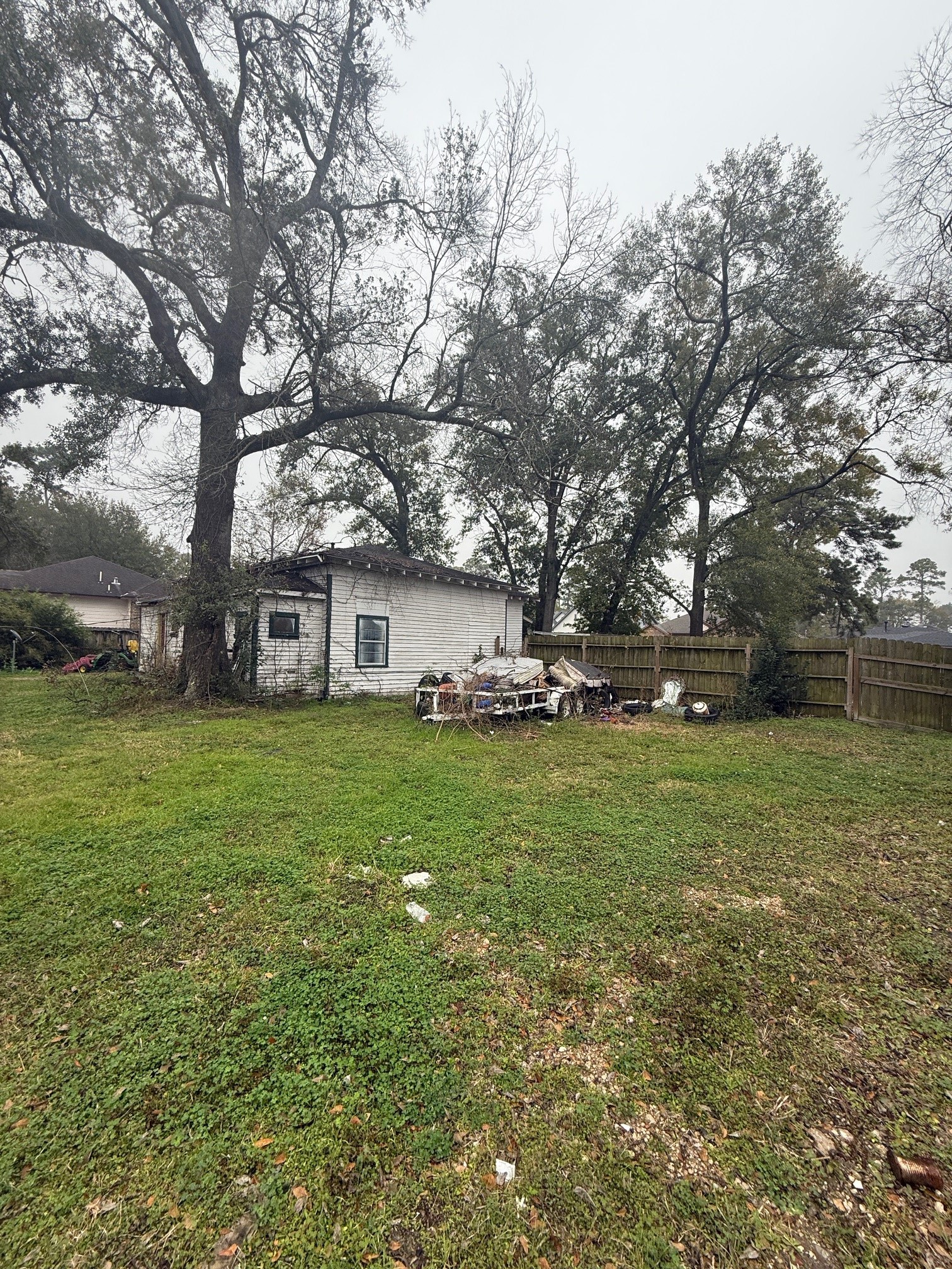 2630 Carmel Street Houston, TX 77091 - Photo 6 of 11 a front view of a house with a garden