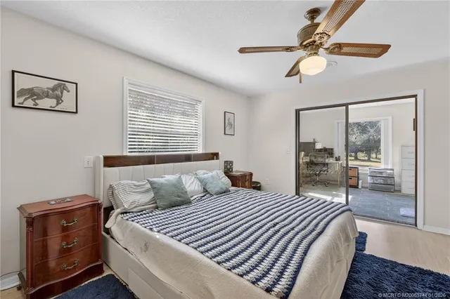 a living room with a couch and a window