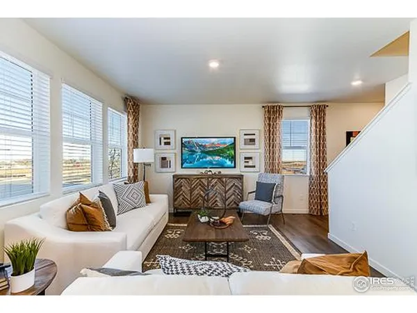 a living room with furniture and a couch