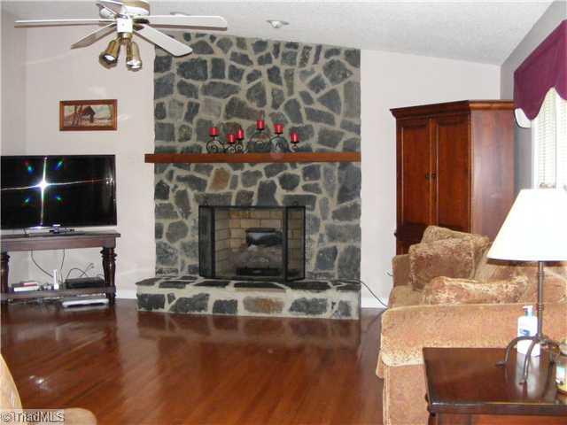 1095 Pool Germanton, NC 27019 - Photo 3 of 14 Living Room. Beautifully finished hardwood floors make this room so inviting