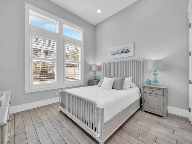 a view of a swimming pool with outdoor seating