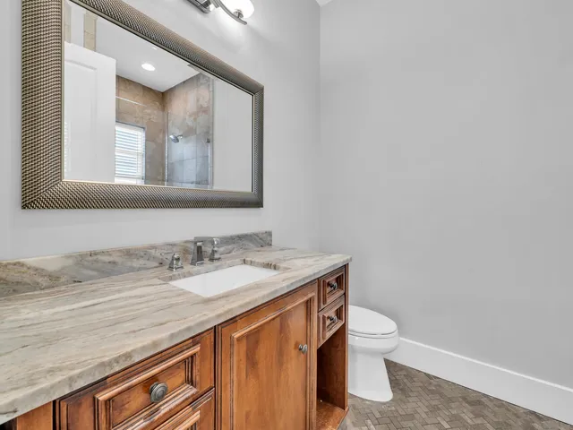 a bathroom with a shower and a bath tub