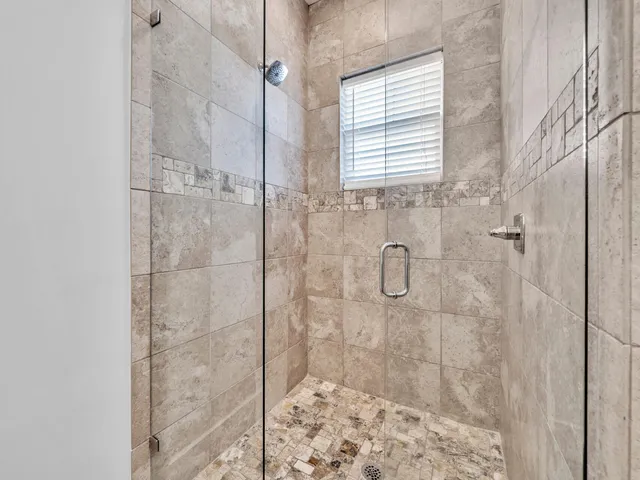 a view of a livingroom with furniture and a window