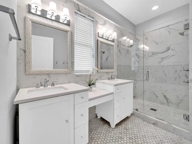 a bedroom with a bed and a table