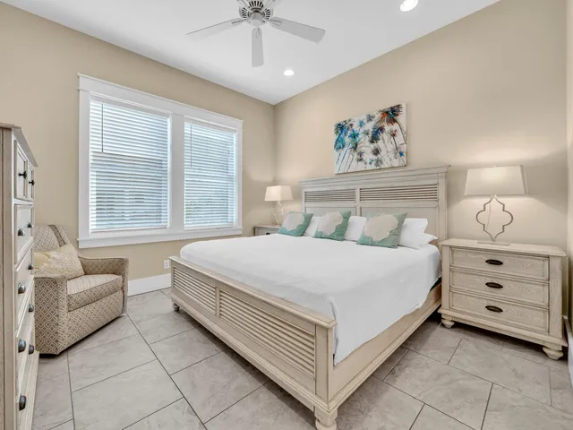 a bathroom with a shower sink and mirror