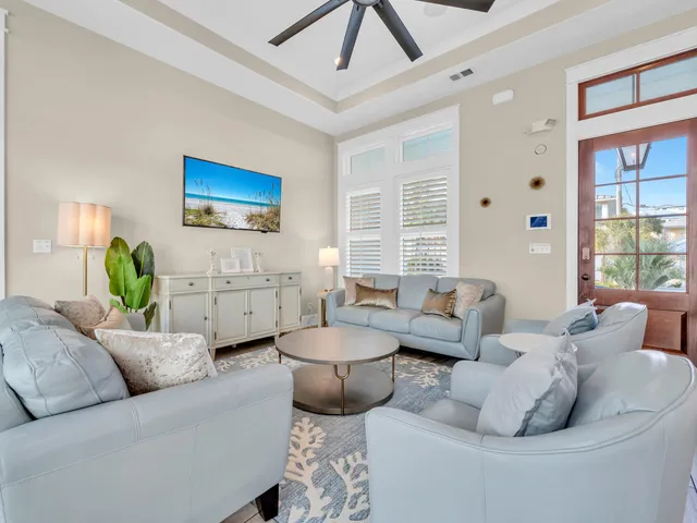 a kitchen with kitchen island a counter space a sink appliances and cabinets