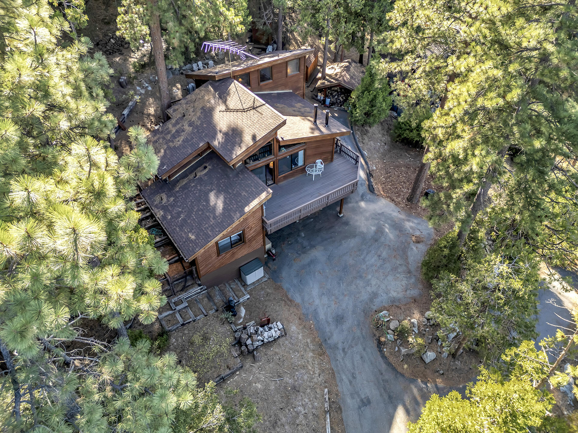 53071 Middleridge Drive Idyllwild, CA 92549 - Photo 2 of 50 an aerial view of a house with garden space and sitting area