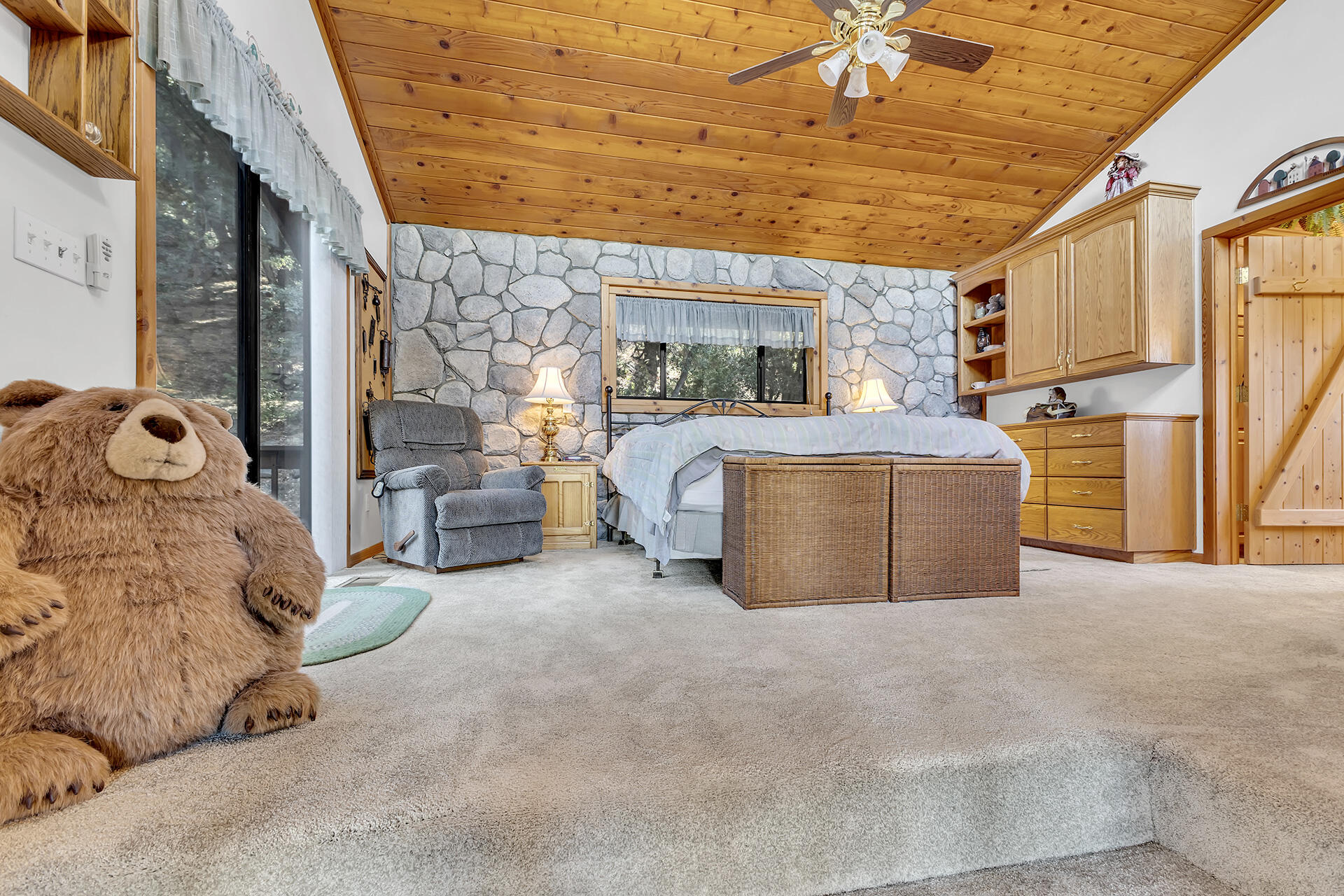 53071 Middleridge Drive Idyllwild, CA 92549 - Photo 22 of 50 a bed room with a bed and a couch