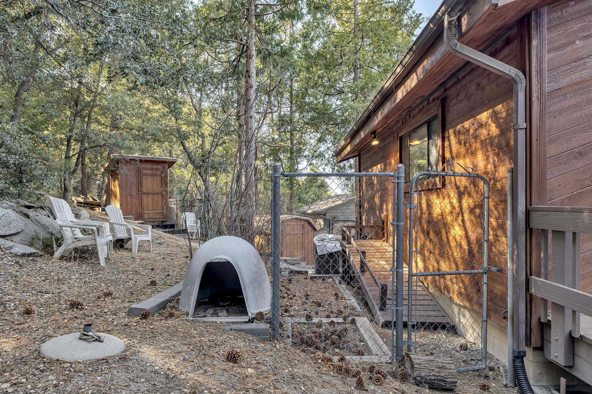 53071 Middleridge Drive Idyllwild, CA 92549 - Photo 46 of 50 a view of a house with backyard porch and sitting area