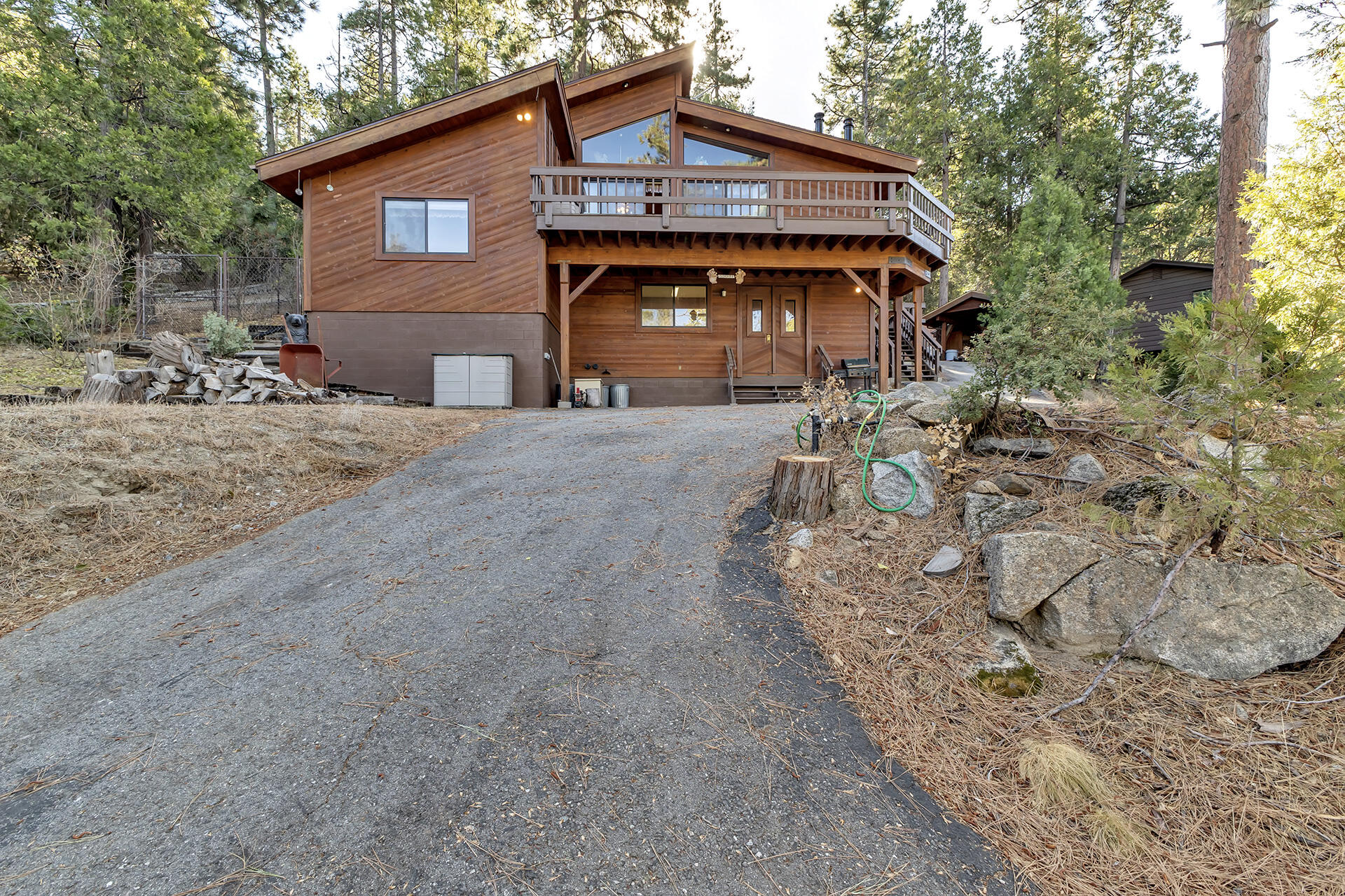 53071 Middleridge Drive Idyllwild, CA 92549 - Photo 5 of 50 a front view of a house with a yard