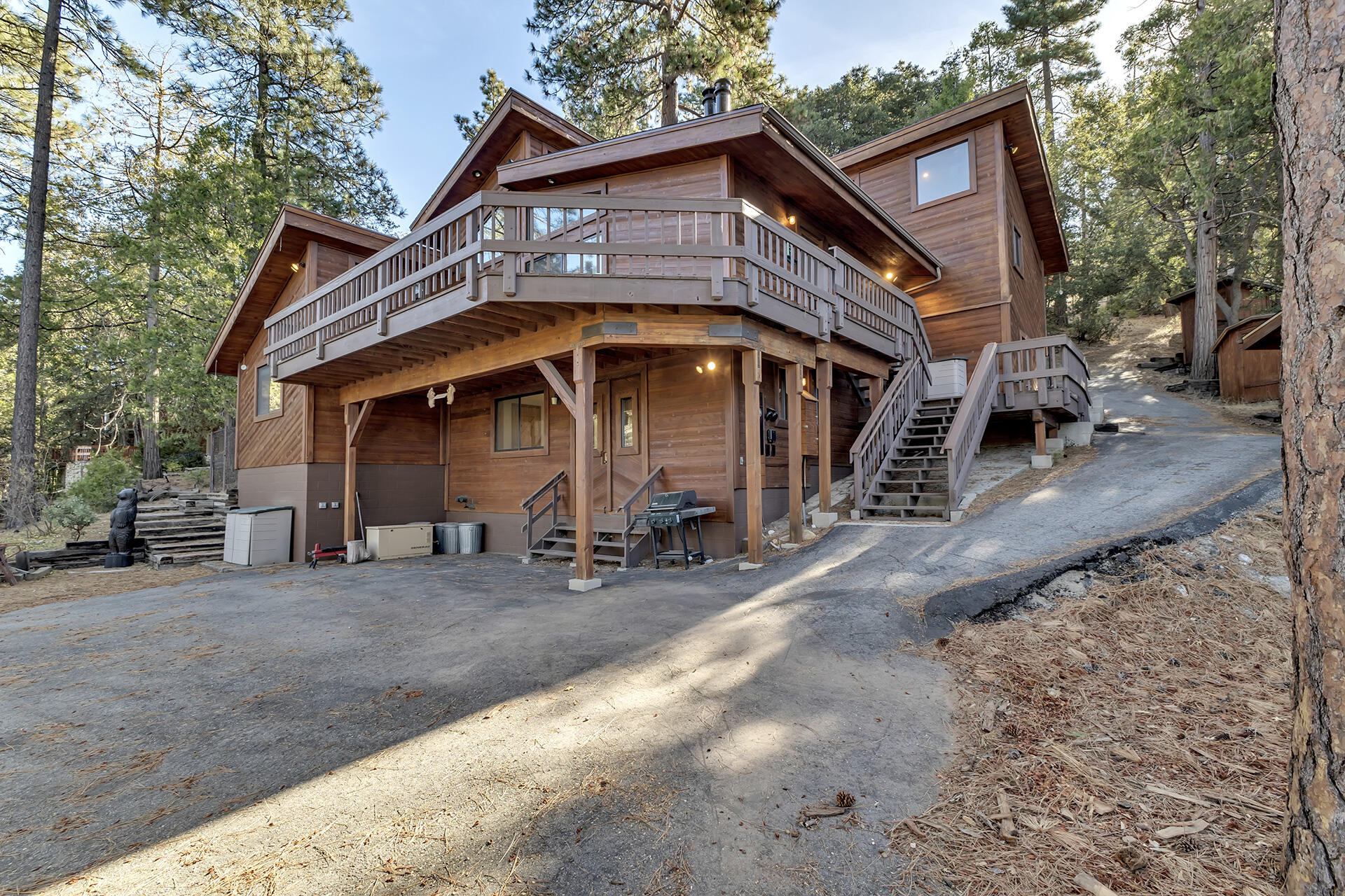 53071 Middleridge Drive Idyllwild, CA 92549 - Photo 6 of 50 a front view of a house with parking area