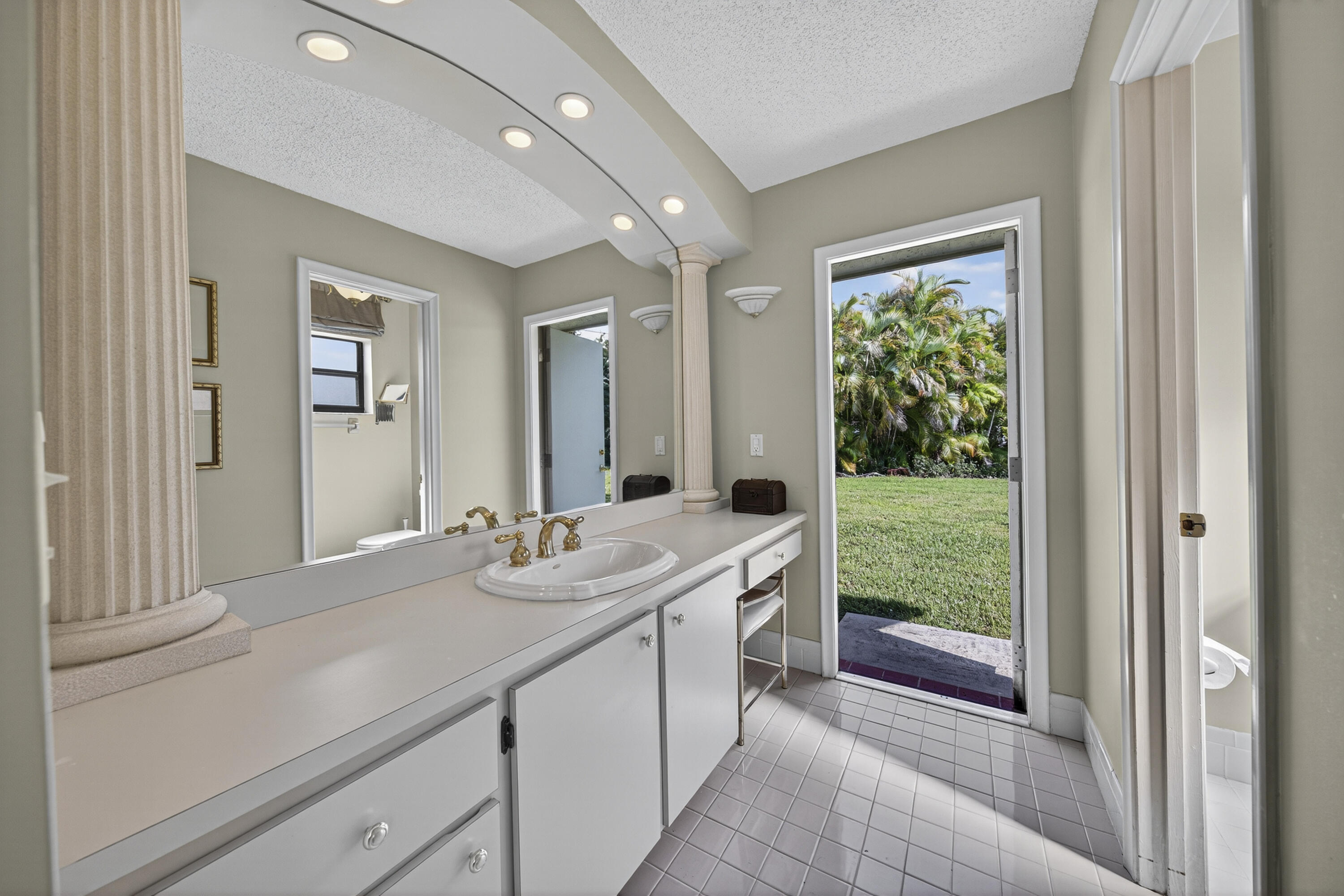 23160 Southwest 53rd Avenue Boca Raton, FL 33433 - Photo 14 of 42 PRIMARY BATH CABANA DOOR