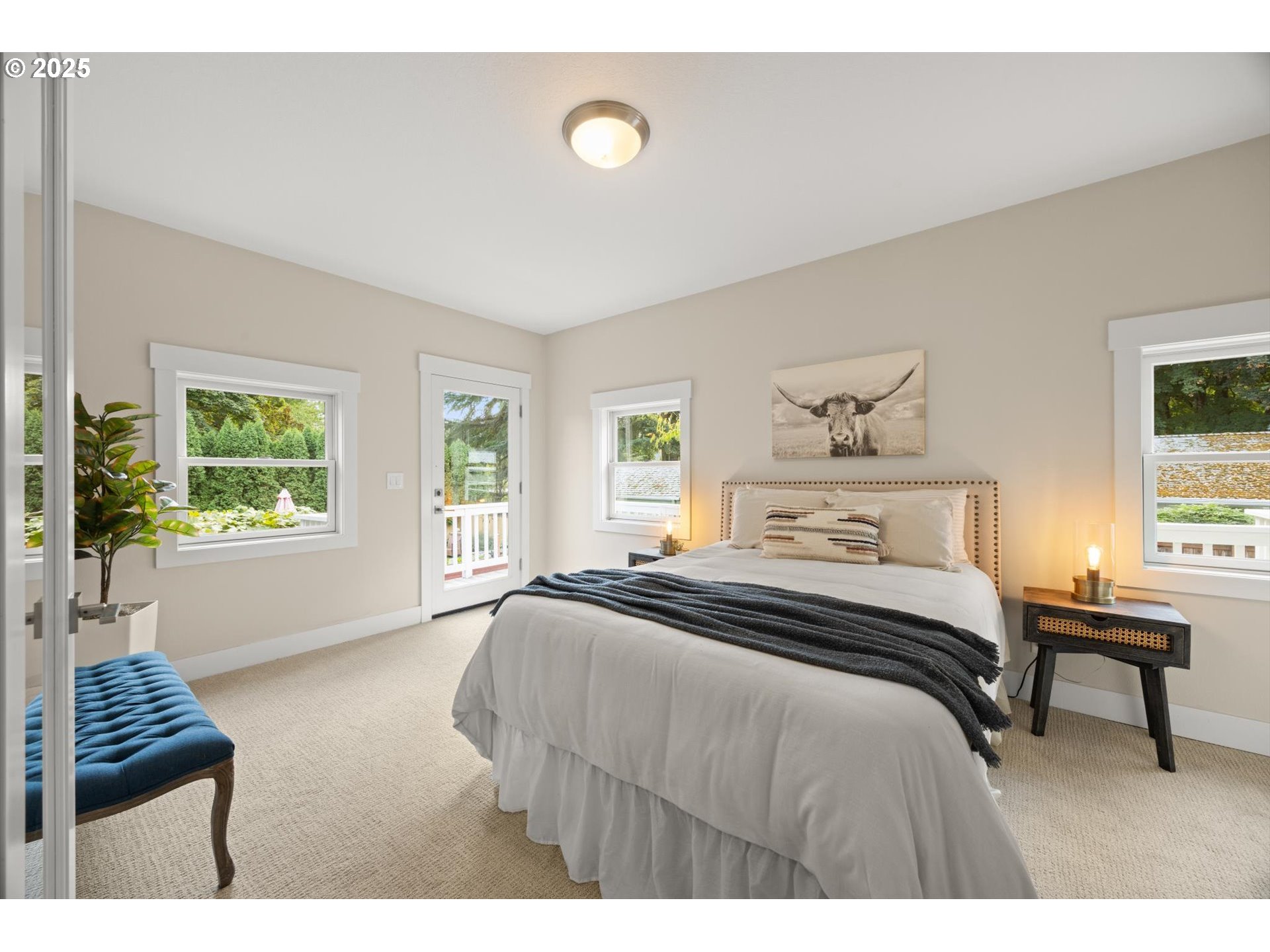 8623 Southeast 11th Avenue Portland, OR 97202 - Photo 17 of 46 a bedroom with a bed and a window
