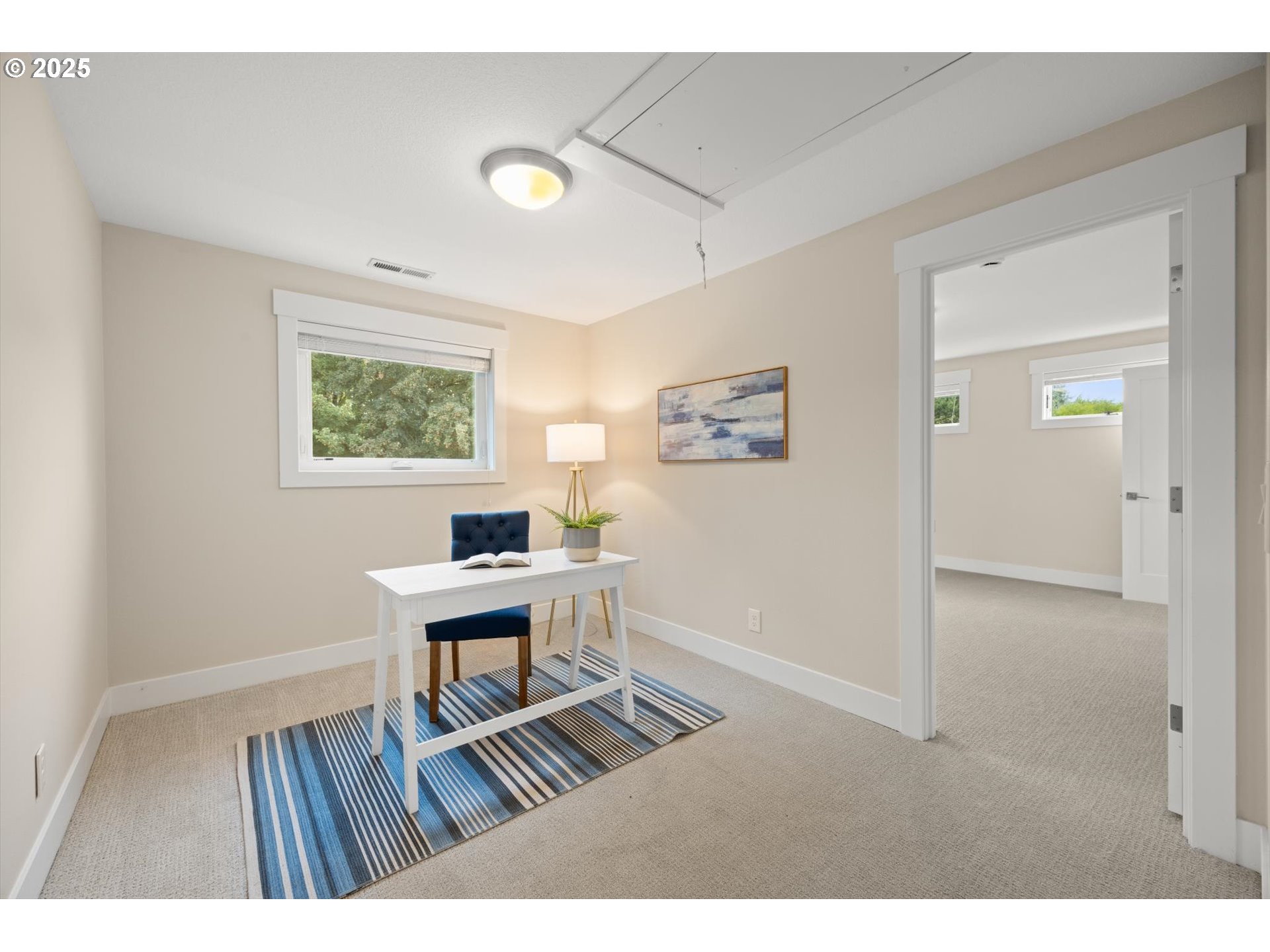 8623 Southeast 11th Avenue Portland, OR 97202 - Photo 24 of 46 a view of a workspace with wooden floor and a workspace