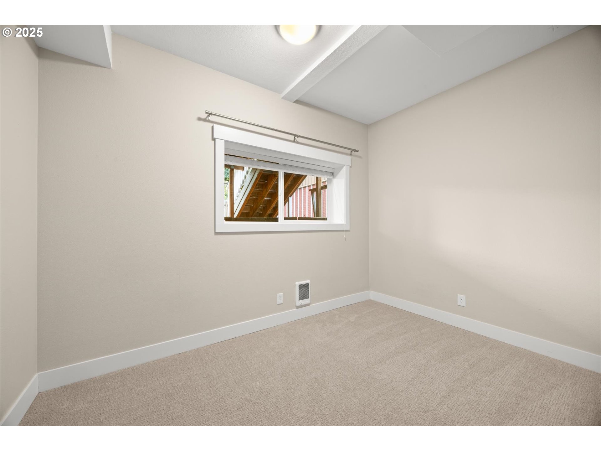 8623 Southeast 11th Avenue Portland, OR 97202 - Photo 32 of 46 a view of an empty room with a window