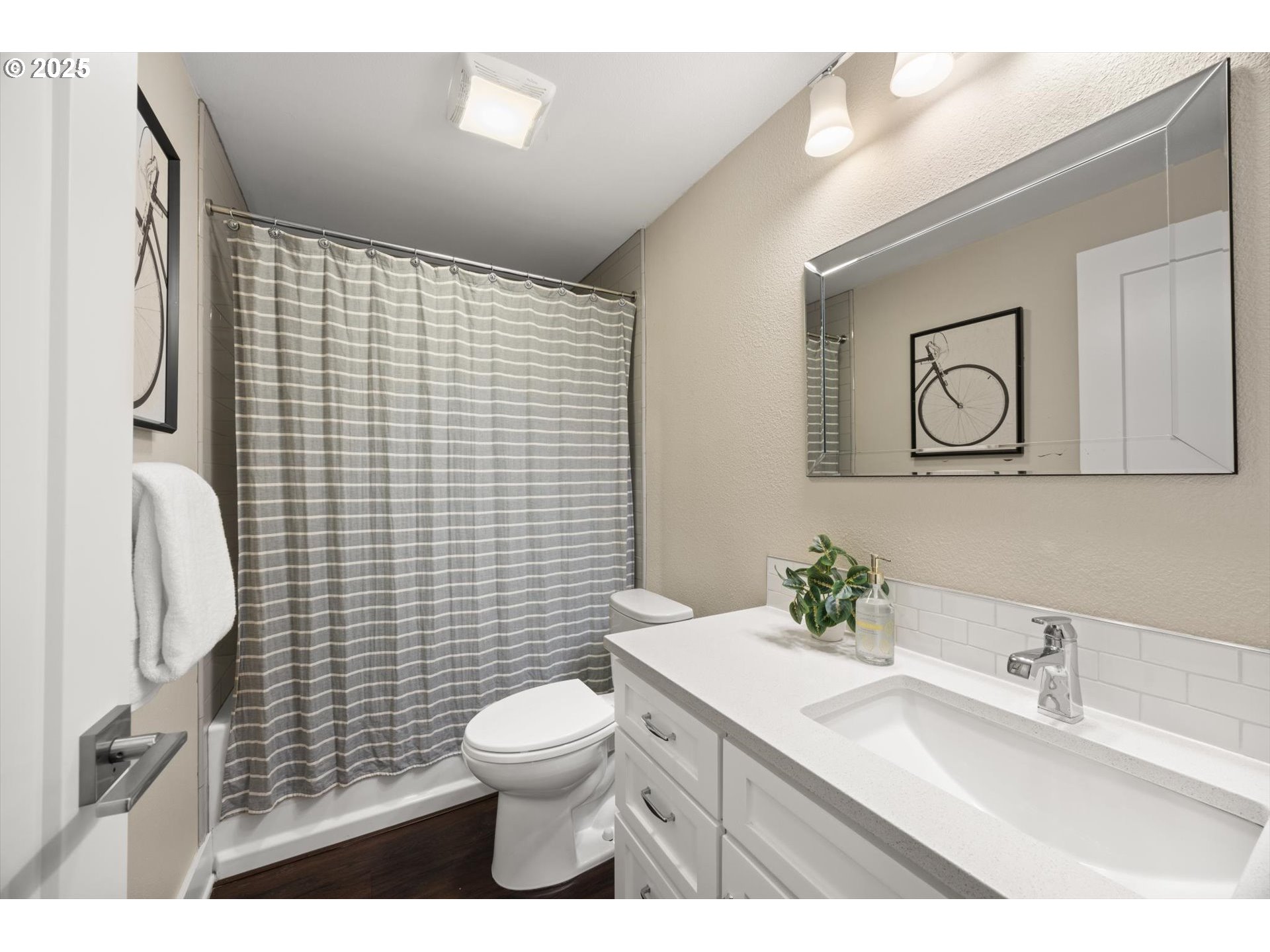 8623 Southeast 11th Avenue Portland, OR 97202 - Photo 33 of 46 a bathroom with a sink toilet and shower