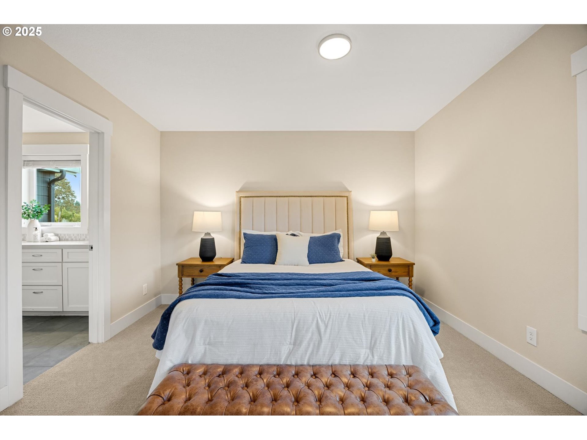 8623 Southeast 11th Avenue Portland, OR 97202 - Photo 5 of 46 a bedroom with a bed and a cabinets