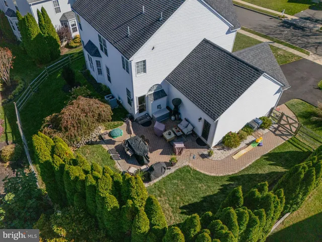 a aerial view of a house with a garden