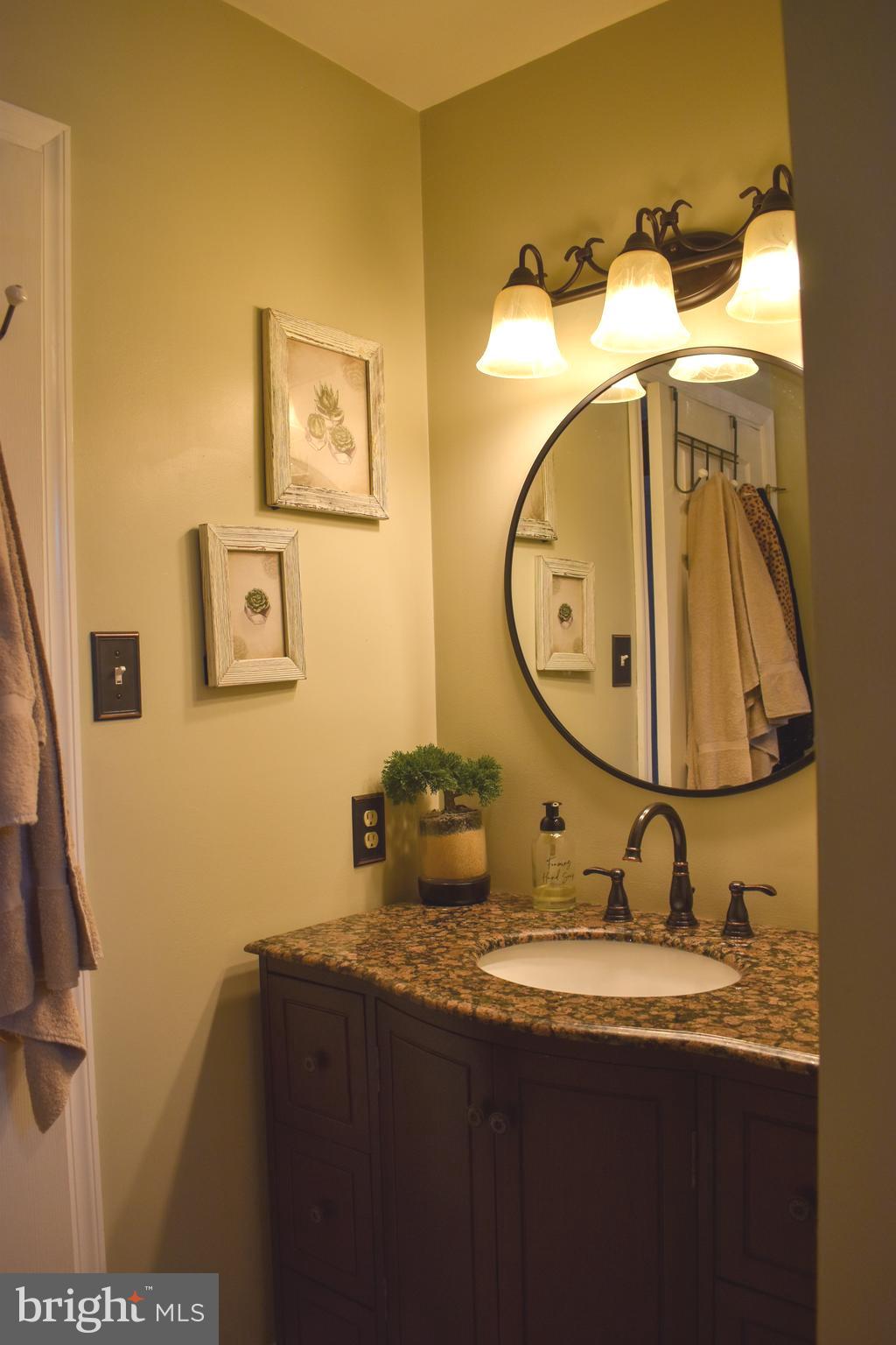 72 Overlook Circle Garnet Valley, PA 19060 - Photo 23 of 26 a bathroom with a sink and a mirror