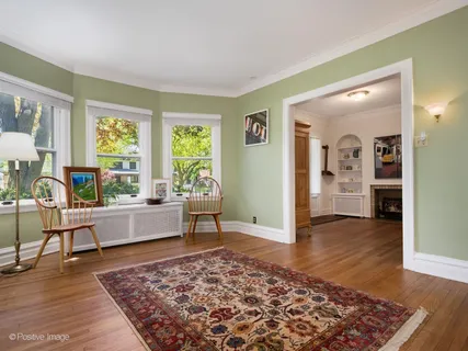 a living room with furniture and a rug